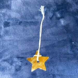 Dior Gold Star (shopping bag charm)